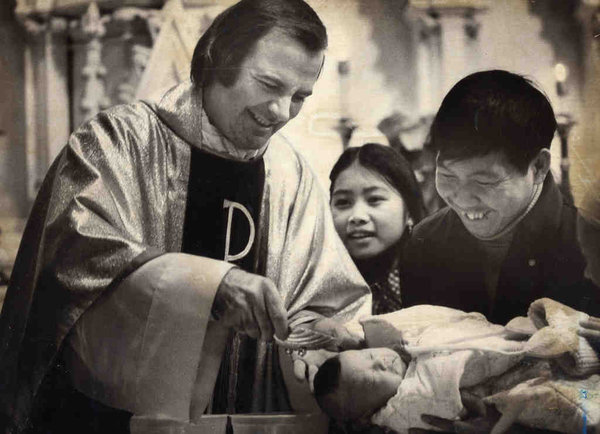 Avery Baptizing a Laotian Child in 1980