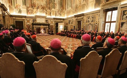 The Pope addresses Curial officials in the Clementine Hall (AP)