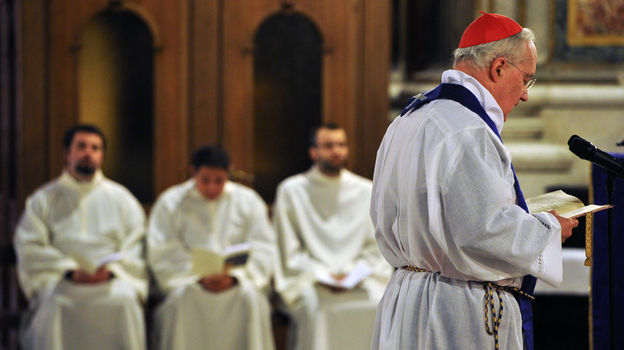 Cardinal Marc Ouellet presides over a penitential Mass at St. Ignatius Church in Rome on Tuesday. The Mass, which asked for the forgiveness of victims of clerical sexual abuse, was part of a Vatican-backed symposium addressing the scandal of pedophile priests and the church culture that enabled such abuse to take place.