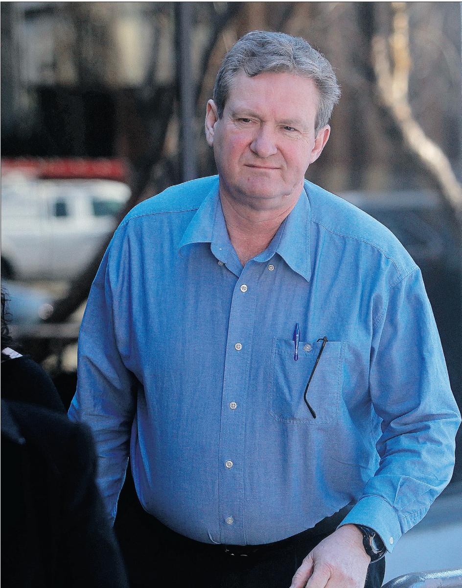 Mark Archibald enters the Red Deer Courthouse on Friday. Archibald, a former pastor and manager of a Christian summer camp, was sentenced to one year of house arrest after having earlier pleaded guilty to indecent assault.