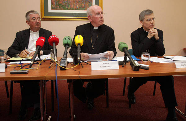 (From left to right) Archbishop of Dublin Diarmuid Martin, Cardinal Sean Brady and papal nuncio to Ireland Archbishop Charles Brown during a press conference in St Patrick's College, Maynooth today. Photograph: Niall Carson/PA Wire