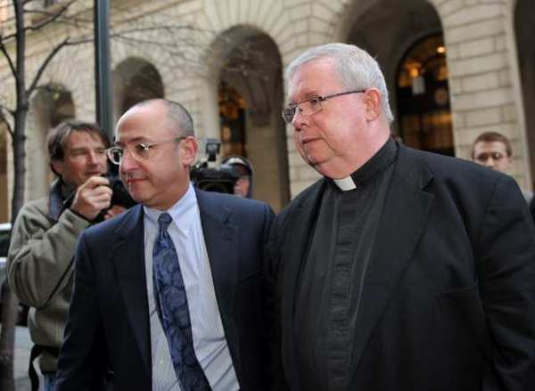 Monsignor William Lynn of Philadelphia is the first Catholic Church official to go on trial for allegedly covering up sexual abuse of children by priests. His lawyer told jurors he tried to isolate abusive priests while bringing the problem to his superiors' attention. (Stan Honda / AFP/Getty Images / March 26, 2012)