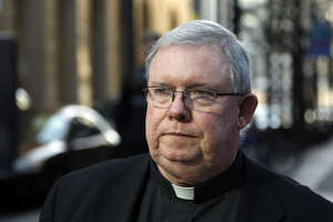 Monsignor William Lynn leaves the Criminal Justice Center, Tuesday, March 27, 2012 in Philadelphia. Lynn is the first Roman Catholic church official in the U.S. ever charged with child endangerment, for allegedly keeping co-defendants former priest Edward V. Avery and the Rev. James J. Brennan, and other accused predators, in ministry. (AP Photo/Alex Brandon)