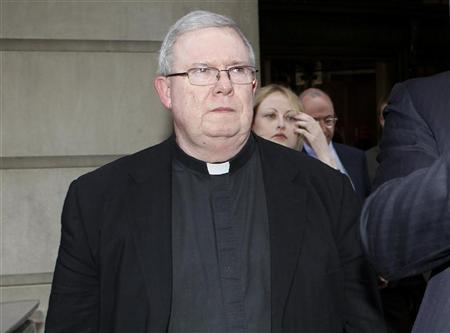 Monsignor William Lynn returns to the courthouse after lunch recess on the opening day of his child sex abuse trial in Philadelphia, Pennsylvania March 26, 2012.