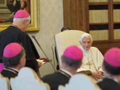 Pope Benedict XVI listens to Archbishop Michael Sheehan of Santa Fe, N.M., during an “ad limina” meeting with bishops from Arizona, Colorado, New Mexico and Wyoming at the Vatican May 5. (CNS/L’Osservatore Romano)