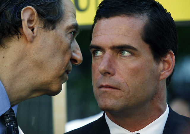 Co-counsel, Paul Mones, left, advises Will Lynch as he arrives for his trial, at the Hall of Justice, in San Jose, on Wednesday, June 20, 2012. Supporters were on hand with placards, protesting the fact that Father Jerold Lindner was never brought to trial for his abuses on Lynch. Lynch in 2010 allegedly beat Lindner, whom he says sexually assaulted him and his brother when they were boys of 7 and 4 years of age. (Karen T. Borchers/Staff)
