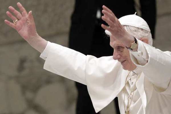 Pope Benedict XVI waves. The Vatican reported its worst deficit in years. (Riccardo de Luca / AP Photo)