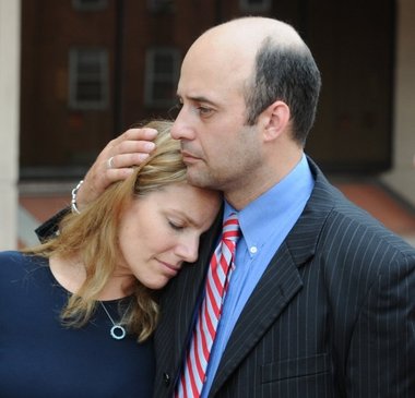 7-27-12 - Springfield- Republican Photo by Mark M.Murray- Andrew Nicastro, and his wife Leigh-Anne , outside the Hampden County Courthouse during a press conference with his lawyers , following the settlement of his case against two former Bishops in the Springfield Catholic Diocese friday.