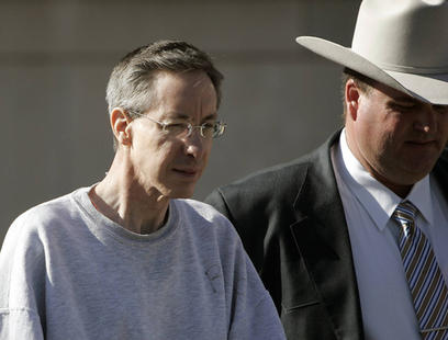 Warren Jeffs is led from the Tom Green County Courthouse in San Angelo, Texas after his pretrial hearing Jan. 5, 2011. (AP Photo/San Angelo Standard-Times, Ken Grimm)