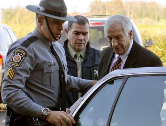 Former Penn State football defensive coordinator Jerry Sandusky was charged with sexually abusing young boys who attended his youth camp over a 15-year period. Also, Penn State athletic director Tim Curley and Penn State vice president for finance and business Gary Schultz, 62, were charged with perjury and failure to report under Pennsylvania’s child protective services law in connection with the investigation into the abuse allegations against Sandusky. (AP Photo/The Patriot-News, Andy Colwell)