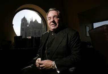 John J. Myers with the Cathedral Basilic of The Sacred Heart outside his office window in Newark in 2010.
