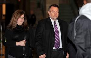 John Langworthy (right) and wife Kathy walk into a courtroom Tuesday at the Hinds County Courthouse in Jackson. / Rick Guy/The Clarion-Ledger