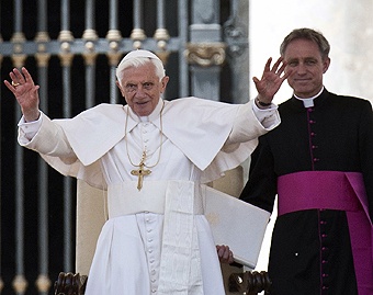 Archbishop Georg Ga?nswein stands behind Pope Benedict XVI in St. Peter's Square. Credit: Mazur/catholicnews.org.uk.