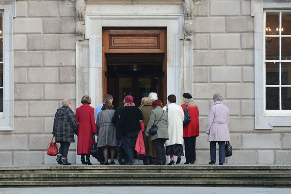 Magdalene women on their way into the Dail to sit in the public gallery for the debate on the McAleese Magdalene report and an apology from Enda Kenny on behalf of the State. Photograph: Alan Betson/The Irish Times