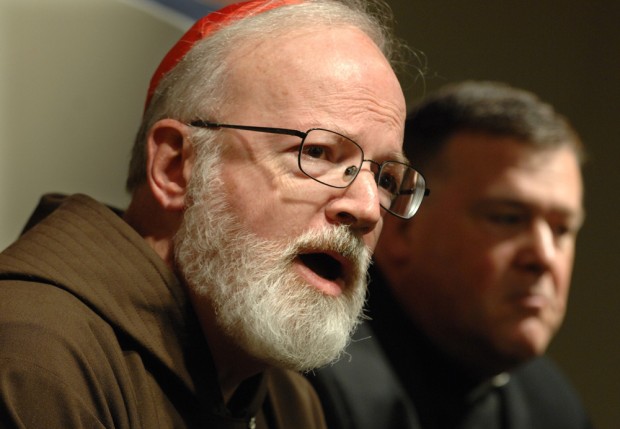 Cardinal Sean P. O’Malley, left, speaks to reporters in 2008. (AP)