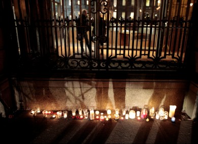 Candles placed outiside grounds of Leinster house by relatives of victims on 19 February.
