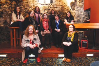 The cast of Eclipsed: (L to R) Laura Crosby, Helen Gregg, Sarah O’Toole, Andrea Kelly, Jean Oldham, Liz Quinn, Orla McGovern, Fiona Kelly, and Lynelle Colleran. Photo:- Mike Shaughnessy