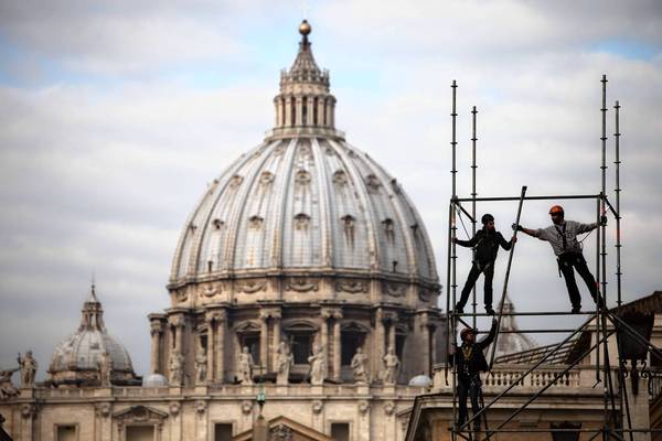 Workers set up a stage for the news media at Vatican City a day before Pope… (Oded Balilty, Associated…)