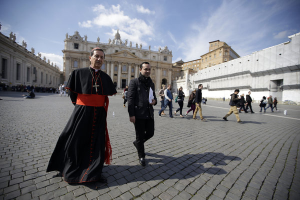 Colombian Cardinal Ruben Salazar Gomez, left, walks in St. Peter's Square after attending a cardinals meeting at the Vatican. (Andrew Medichini / Associated Press / March 4, 2013)
