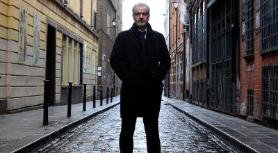 Colm O'Gorman, executive director of Amnesty International in Ireland, poses for a photograph in Temple Bar, Dublin March 6 (Reuters/Cathal McNaughton )