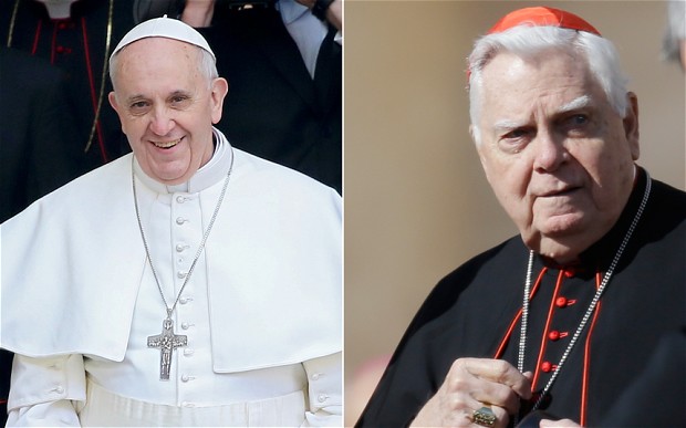 During his unscheduled visit to a basilica in Rome Pope Francis briefly greeted Cardinal Bernard Law, right Photo: Reuters/AP