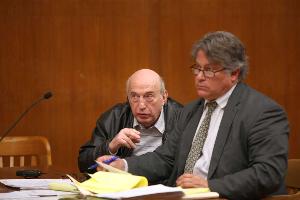 Rabbi Uzi Rivlin, left, seated with his attorney Howard Simmons, appeared in a Hackensack courtroom for a pre-trial hearing last week. He is accused of molesting two teenage boys at his home.