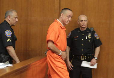 Rev. Michael Fugee appears in court on charges of violating a court-sanctioned agreement that bars him from working with children.