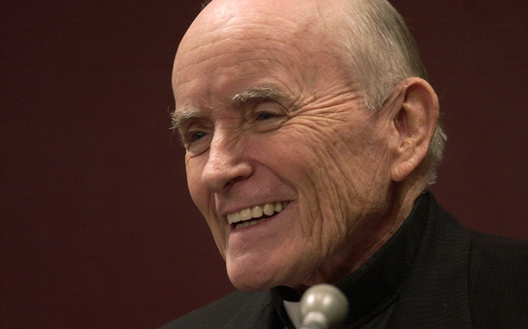 Fr. Andrew Greeley speaks during a panel discussion on "Being Catholic in Chicago," part of the four-day Catholic Festival of Faith, in 2003. (CNS/Karen Callaway)