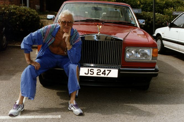 Jimmy Savile with his Rolls-Royce