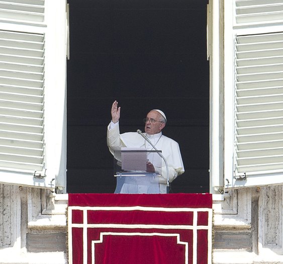 Pope Francis gives the Angelus prayer from the window of the apartments at St Peter's square on at the Vatican. (Tiziana Fabi / AFP / Getty Images / August 4, 2013)