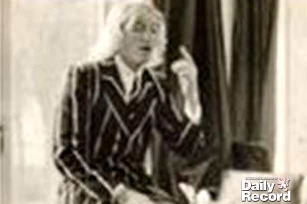 Jimmy Savile photographed in the library at Fort Augustus Catholic schoo