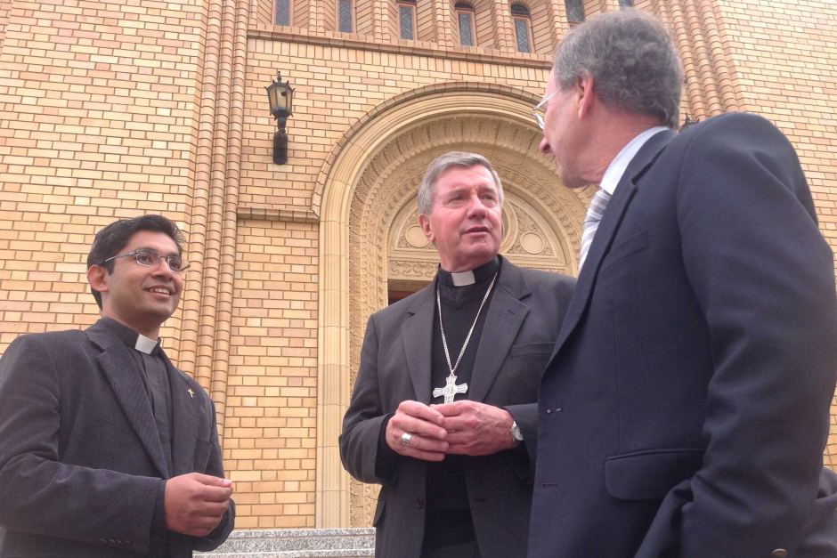 Father Varghese Vavolil, Bishop Christopher Prowse and communications director Geoff Orchison.