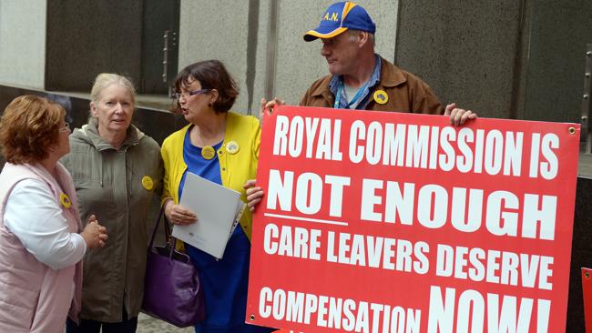 Supporters wait outisde the inquiry yesterday. Picture: Jeremy Piper Source: AFP
