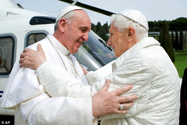 Greetings: Pope Francis (left) meets Pope Emeritus Benedict (right) XVI in Castel Gandolfo in March. Benedict has emerged from his self-imposed silence to publish a lengthy letter to one of Italy's most well-known atheists