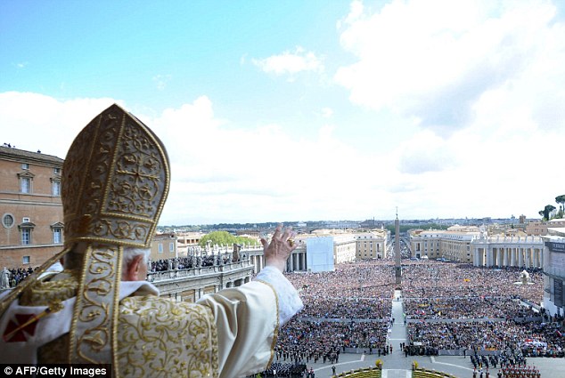 Speaking: Pope Benedict XVI delivers a message and blessing to faithful from the central loggia of St Peter's Basilica after the Easter Holy Mass at the Vatican in April 2012