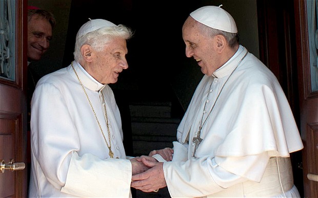 Pope Emeritus Benedict XVI, left, with Pope Francis in May this year Photo: LAURENT KALFALA/AFP