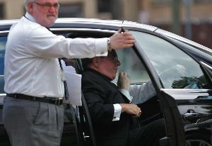 Newark Archbishop John J. Myers, exiting the car, was at the Bergen County Courthouse on Thursday. A spokesman said he could not confirm why.
