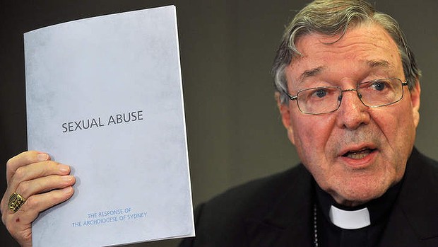 Fighting back: Cardinal George Pell with the church's response to sexual abuse claims. Photo: Leigh Henningham