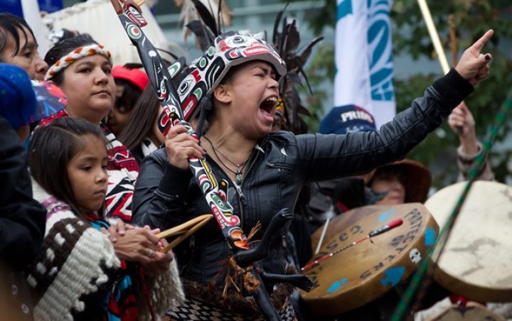 A First Nations woman cheers while taking part in the Walk for Reconciliation in Vancouver, B.C., on Sunday September 22, 2013. Thousands of people attended the walk that wrapped up a week of Truth and Reconciliation Commission of Canada events in the city.