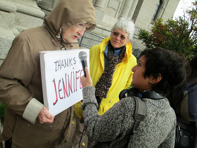 Above: My friend Paula Ruddy being interviewed by Rupa Shenoy of Minnesota Public Radio. Paula's sign expresses her gratitude to Jennifer Haselberger.