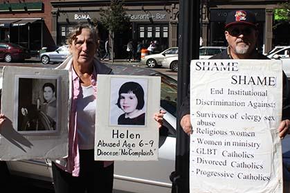 Ruth Moore and Stan Doherty, longstanding members of the group STTOP, outside the Cathedral of the Holy Cross