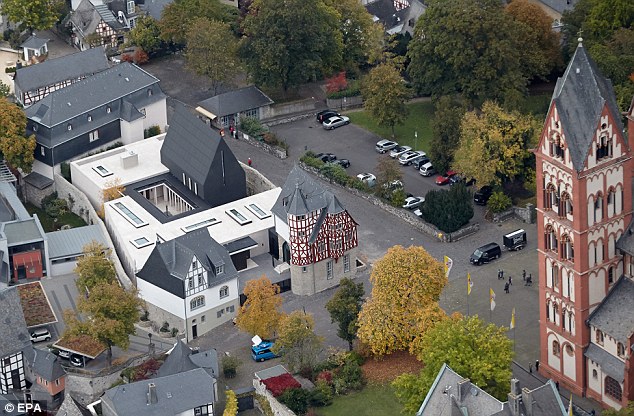 Prime location: The decadent residence is facing the Limburg Cathedral, right.