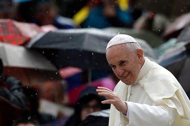Pope Francis blesses the faithful during the weekly general audience in St. Peter's Square, at the Vatican, Wednesday, Oct. 9, 2013.