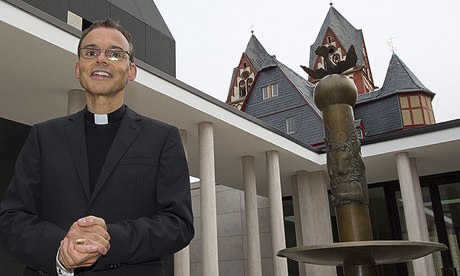 Franz-Peter Tebartz-van Elst, bishop of Limburg, in the inner courtyard of the palace, which has cost 10 times the original estimate. Photograph: Boris Rossler/EPA