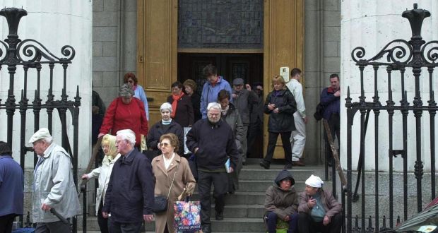 Massgoers leaving the Pro Cathedral in Dublin. “The institutional C church will have to heal the many wounds it has inflicted on so many people in the past,” Msgr Lane said.