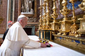 Jorge Mario Bergoglio attends his first private Mass as Pope Francis in the Basilica of Santa Maria Maggiore on March 14, 2013 in Rome, Italy. (L'Osservatore Romano/Getty Images)