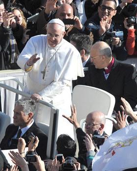 Mgr Xuereb is seen behind the Pope in this file photo by Matthew Mirabelli.