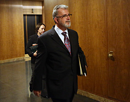 Thomas Wieser and Jennifer Larimore, attorneys with the law firm Meier, Kennedy & Quinn, approach a Ramsey County District courtroom where they represented the Archdiocese of St. Paul and Minneapolis. (Jeffrey Thompson/MPR News)