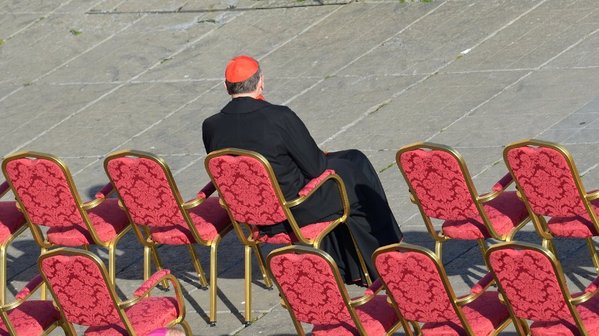 Cardinal Roger Mahony sits in St. Peter's Square last February ahead of Pope Benedict XVI's last weekly audience. (Alberto Pizzoli / AFP/Getty Images)
