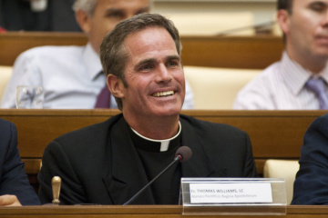 Father Thomas Williams gestures during a 2011 meeting in Rome